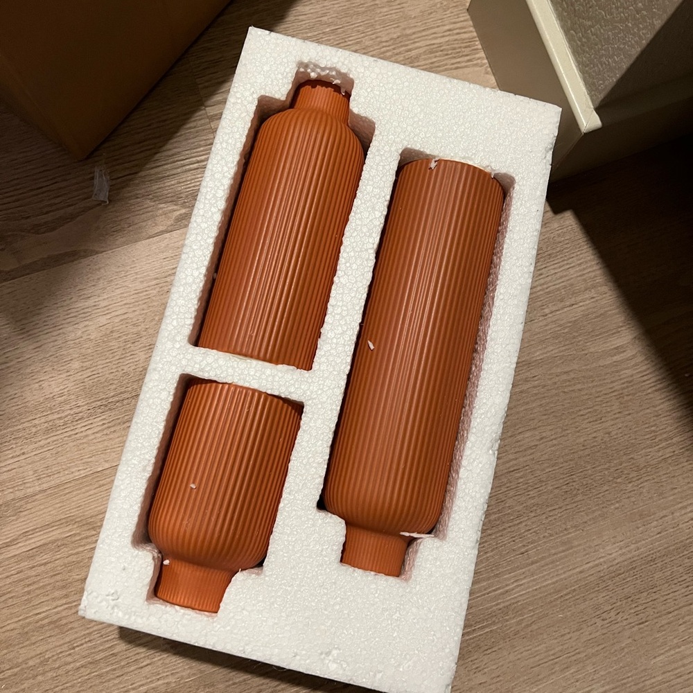 Set of Three Terracotta Ribbed Vases
